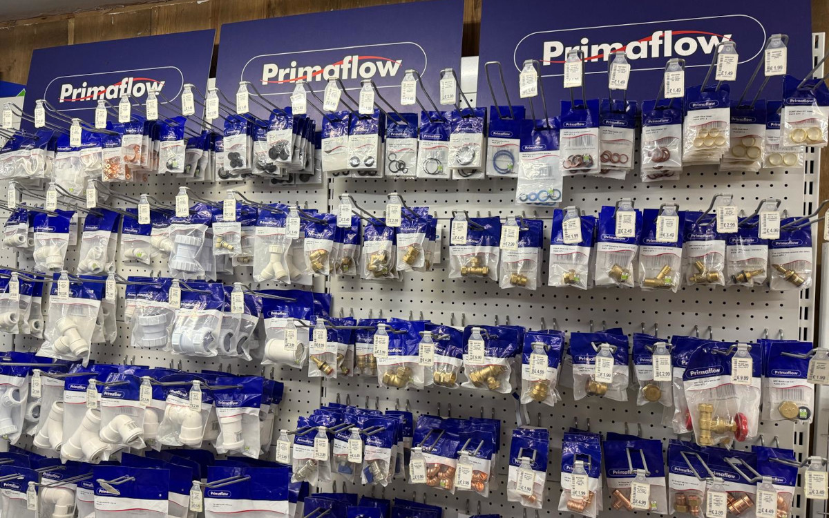 Plumbing supplies on a shelf